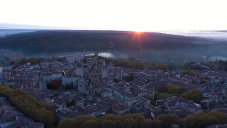 large-aerial-view-over-Uzes-France-Gard-mystic-morning-with-clouds-and-sunrise